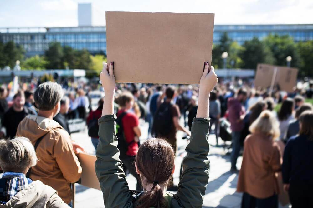 Person holding up sign