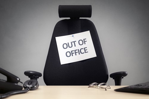 an out of office sign because someone has take paid parental leave