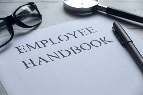 An Employee handbook containing HR Policies.